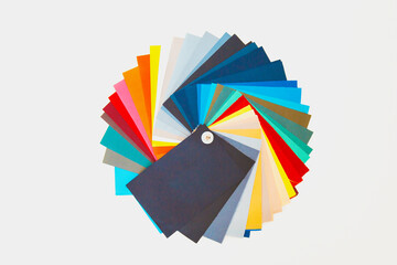Sample of textile various colors, background on white table .Catalog and palette tone of fabric for...