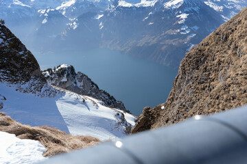 Pilatus – the dragon mountain on Lucerne’s doorstep. Escape the city and head up to Pilatus Kulm at an altitude of 2'132 m on the world’s steepest cogwheel railway. The arrival by boat or by train - obrazy, fototapety, plakaty