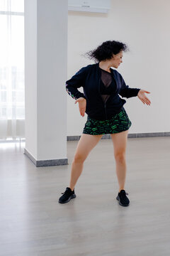 Brunette Woman 30-35 Years Old Smile And Like Zumba Dance. Concept Active Dancing