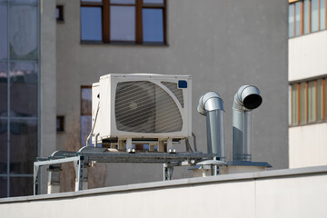 external air conditioner condenser with ventilation pipes