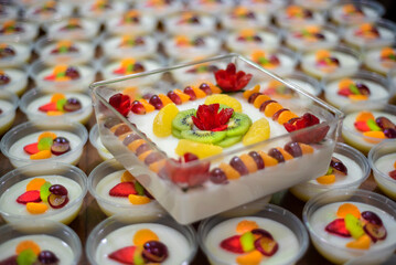 Delicious and fresh fruit puddings on the table