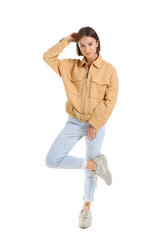 Fototapeta premium Pretty young woman in stylish clothes on white background