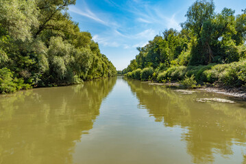 Fototapeta na wymiar View of Sfantu Gheorghe branch (Saint George), a distributary of the river Danube, in the Danube Delta, Romania, a UNESCO World Heritage Site