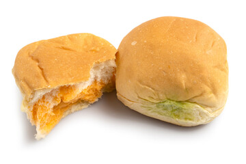 Close up of soft buns stuffed with sweet egg custard, Thai dessert custard bun isolated on white background. Clipping path.	
