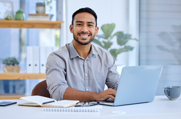 Success is simply just a part of my day. Portrait of a young businesswoman working on a laptop in an office.