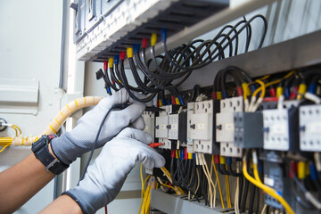 Electricity and electrical maintenance service, Engineer using measuring equipment tool checking...