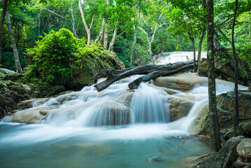 Beautiful Erawan tropical waterfall in Kanchanaburi province, Thailand. Travel in Asia concept.