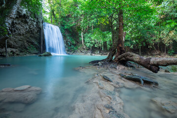 Beautiful Erawan tropical waterfall in Kanchanaburi province, Thailand. Travel in Nature concept.