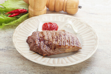 Grilled rib-eye steak beef meat