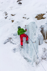 Rescuers climbers in training in the mountains in winter.