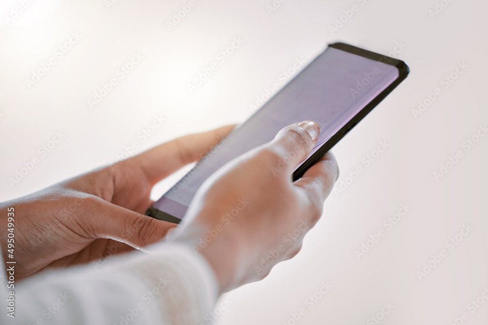 Poster Lets communicate. High angle shot of an unrecognizable businesswoman sending a text message while in the office.