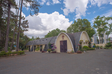 Landscape photo: chicken church. Time: March 20, 2022. Location: DaLat city.  The name of the chicken church is because the top of the bell tower has a big chicken image. 