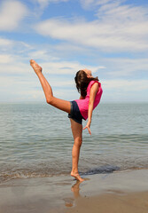 little girl on seashoe during workout