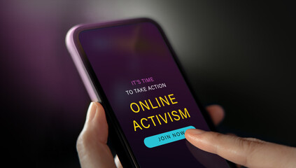 Online Activism Concept. Hand Using Mobile Phone to Join an Internet Community for Social Movement. Closeup shot
