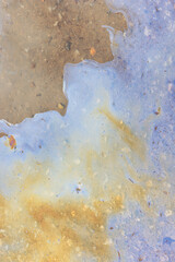 puddle gasoline background, wet oil multicolored rainbow pollution spill