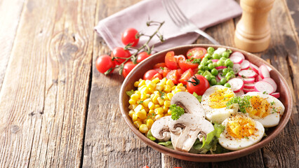 vegetable salad with tomato,  egg,  corn and radish
