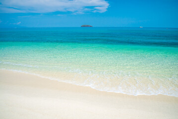 Fototapeta premium Crystal clear water of tropical island beautiful beach in sunny day - Summer breeze travel holiday concept.