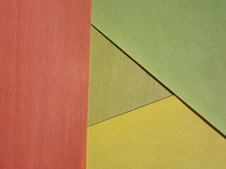 Fototapeta premium Background surface made of green and red paper