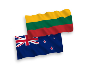 National vector fabric wave flags of Lithuania and New Zealand isolated on white background. 1 to 2 proportion.