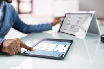 Young Businessman Using Laptop