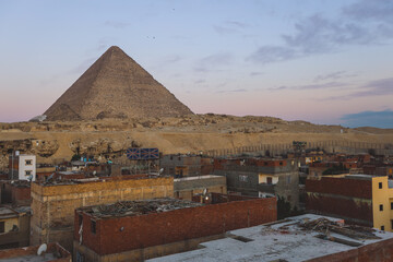 Sunset View to the One of the Wonders of the Ancient World - Great Pyramids of Giza with Colorful...