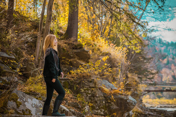 Vacation time, concept of weekend in mountains. Girl at nature. Beautiful landscape scene in Eastern Europe