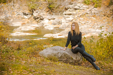 Vacation time, concept of weekend in mountains. Girl at nature. Beautiful landscape scene in Eastern Europe