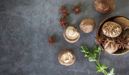 Shiitake mushrooms on stone table background. top view