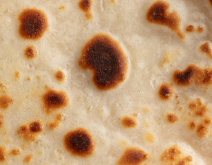 Pan fried pancake as a background.