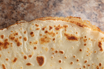 Pan fried pancake as a background.