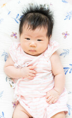 asian baby female with good mood