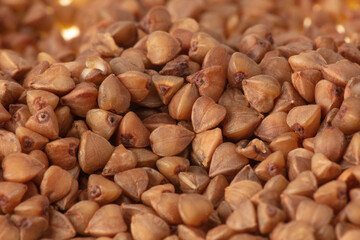 Close-up of buckwheat groats as background.