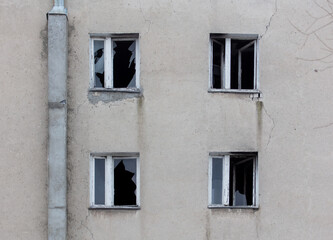Fototapeta na wymiar Broken window in the wall of the building