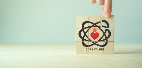 Core values,corporate values concept.  Company culture and strategy related to business, people relationships, company growth. Principles guide company's action. Core values icon on wood block. Banner - obrazy, fototapety, plakaty