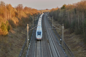 electric highspeed train passing the rapid railway transit route between Stuttgart and Mannheim, Baden-Wuerttemberg, Germany