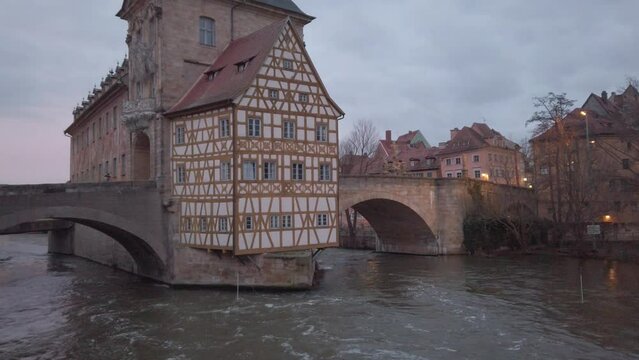 4k. Bamberg. View of Old Town Hall of Bamberg Altes Rathauswith two bridges over the Regnitz river, Bavaria, Germany