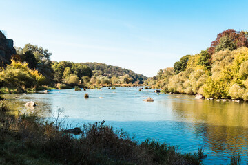 autumn in the mountains where the river overflows

 