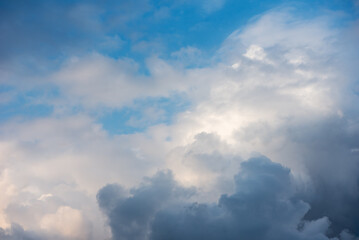 Fototapeta premium Stormy Clouds In The Blue Sky. Cyclone Coming. The Weather Is Getting Worse, Rain Is Coming.