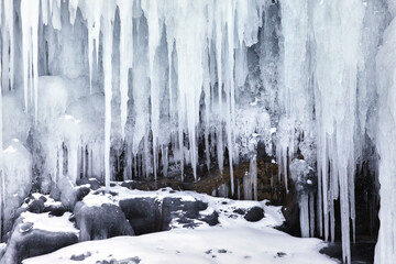 Frozen splash water on Baikal lake. Abstract winter background. Amazing scenery with frozen water