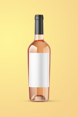 A clear bottle of rose wine isolated on a yellow background for mockup presentation projects.