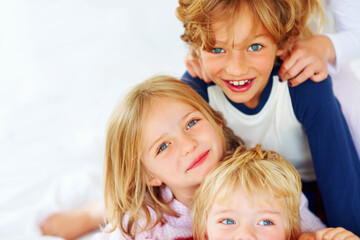 Cute little brothers and sisters playing together. Portrait of cute little brothers and sisters playing together.