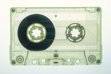 Closeup of one vintage green audio cassette