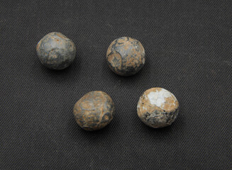Old lead bullets on black background