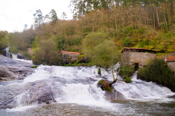 Waterfall of the Rio Barosa in the natural park of Barro in Pontevedra - Spain
