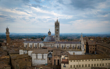 Fototapeta premium Architecture of medieval Siena town and cathedral from above. Aerial drone photo, Siena, Tuscany, Italy