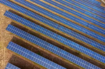Aerial view of Solar panel, photovoltaic, alternative electricity source - concept of sustainable resources on a sunny day