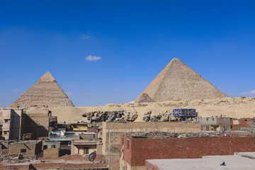 Beautiful View to the One of the Wonders of the Ancient World - Great Pyramids of Giza under Blue...