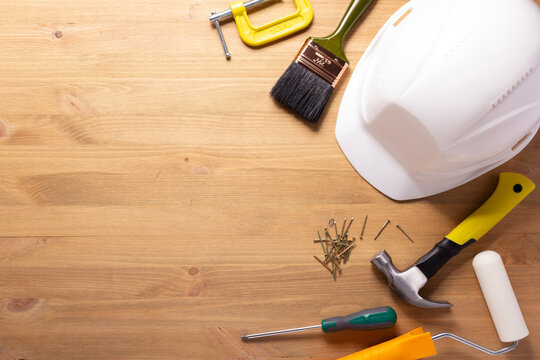 Construction tools on wooden background. Construction concept