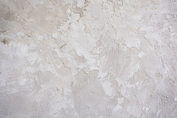 artistic plaster on a gray and white wall. Repairs. elements of wall decor. copy space. texture. background.