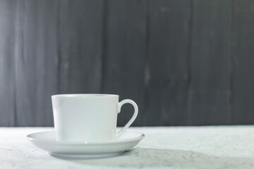 Empty and clean white cup and saucer